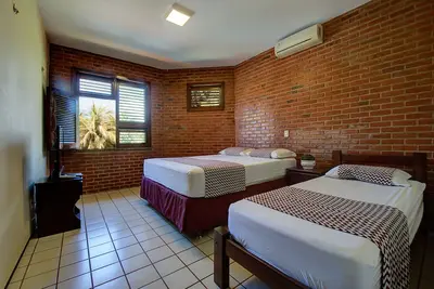 Image de Grand luxe - 5 Suites Ar / Tv - 100m Beach Park - 23 Personnes