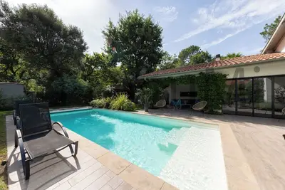 Image de Villa 170m² Standing 6 ch 14 pers, piscine chauffée, 200m plage, 300m centre