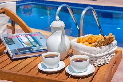 Image de villa avec piscine privée Idéalement située à seulement 50 mètres de la plage de sable du Lido à Faliraki