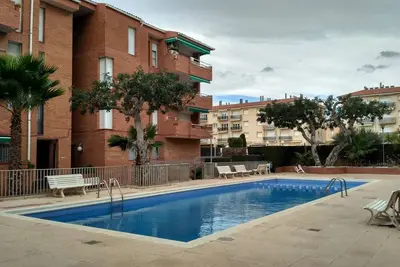 Image de Appartement confortable, Wi-Fi A / C et piscine.
