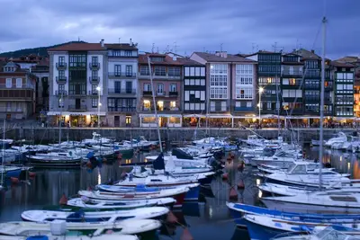 Image de Appartement avec terrasse, WiFi et parking privé.