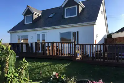 Image de Magnifique chalet côtier disponible en juin, bain à remous, vue sur le parking de la baie, garde