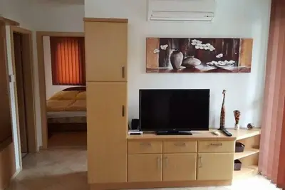 Image de Appartement moderne avec de l'air pour 4 + 2 personnes avec piscine et barbecue, Wifi gratuit