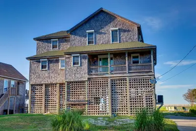 Image de Fo'get About It, la maison de front de son Frisco Nc