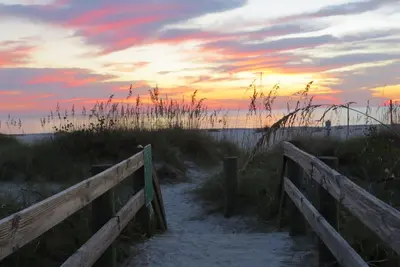 Image de \"Elle vend des coquillages\" 🐚 Gulf View Golf Cart