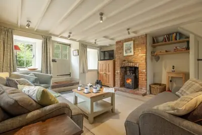 Image de Un beau chalet récemment rénové, décoré avec goût et spacieux.