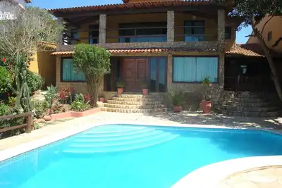 Image de Grande maison à Geribá avec 6 suites, piscine, barbecue, garage, vue mer