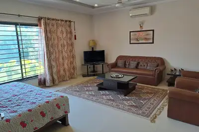 Image de Suite familiale, 2 chambres avec salle de bain commune et une salle à manger