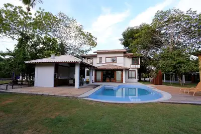 Image de Maison de luxe avec piscine et grand espace vert à Costa do Sauipe