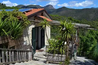 Image de Nonno Paco - Des structures indépendantes entourées de verdure à deux pas de la mer