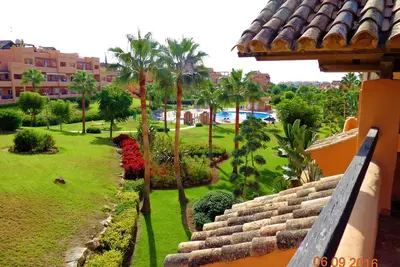 Image de Belle Penthouse 2 chambres Apt-Terrasse privée-Piscine communautaire-Près de la plage - A / C