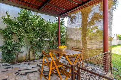 Image de Maison de vacances confortable avec terrasse et grill