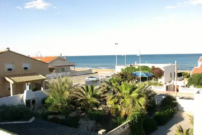 Image de Bungalow mitoyen pour 4-5 personnes à 50 m de la plage de sable et proche du centre