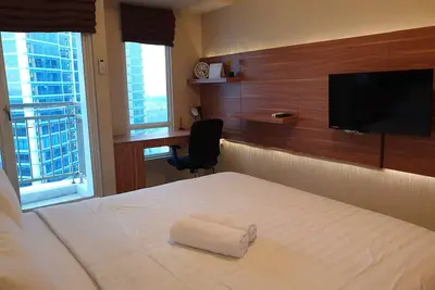 Image de Appartement de luxe Cosmy Orchard 2 au centre commercial Pakuwon