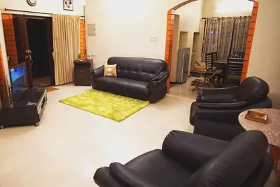 Image de Nandhanam Eco Home Stay Ac avec options de vélo / voiture