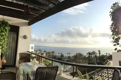Image de 5 * appartement vue mer sur la plage et de golf