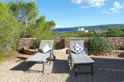 Image de Appartement avec une vue magnifique sur la mer! Près d'Es Caló et de petites baies de baignade