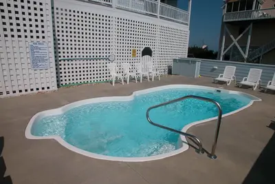 Image de Détendez-vous Soundside Avon w / lac, piscine, bain à remous, Game Rm, ascenseur bagages