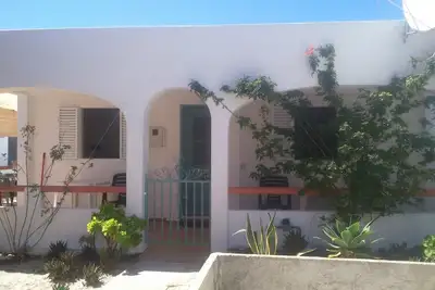 Image de Beach House dans un endroit fantastique avec une vue imprenable.