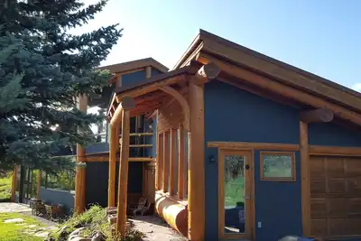 Image de Charmante maison en rondins nichée sur une colline surplombant la vallée de Teton