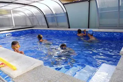 Image de Appartement de vacances proche du centre avec piscine