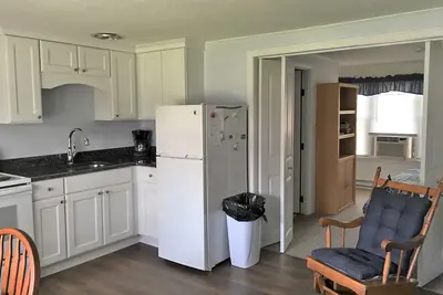 Image de Plage directement à travers St + piscine chauffée, 4 couchages, A / C