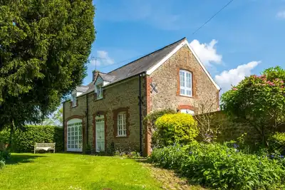 Image de Coach House du 16ème siècle situé dans de beaux jardins