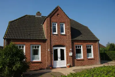 Image de Friesenhaus exclusifs * * * * * avec vue sur mer, sauna, sans fil, handicapés
