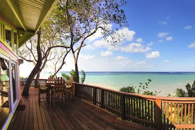 Image de L'orchidée rose: une vue imprenable sur l'océan depuis Waterfront Home