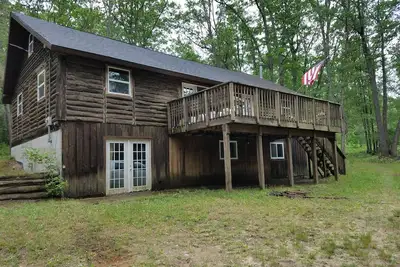 Image de Rustique cabane loger 4 chambres dans le bois