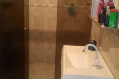 Image de maison près du centre de imbituba sc 3 chambres et piscine