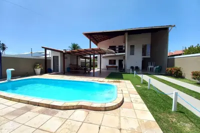 Image de Maison avec 06 chambres, piscine, barbecue à quelques mètres de la plage