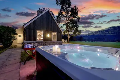 Magnifique chalet converti avec vue imprenable sur le lac et la montagne