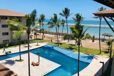 Image de Location Appartement La Fleur Polynésie, meilleur tronçon de la plage de Muro Alto.