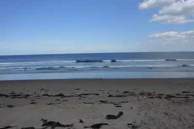 Image de Une maison magnifiquement mise à jour Moody Beach-12 couchages
