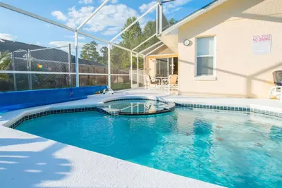 Image de Florida Villa Lake Side View avec 36 pieds plein sud Pool & Spa