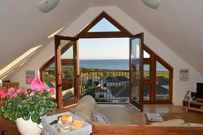 Penthouse de luxe sur la plage avec une vue imprenable sur la mer