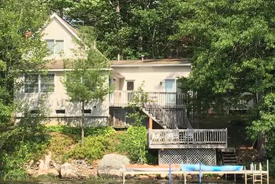 Image de Belle propriété au bord du lac avec toutes les commodités