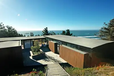 Image de Ocean House avant dans le ciel de Windsurfer