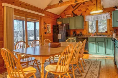 Image de Belle maison de campagne à Saddleback Lake Lodge Cottage Communauté