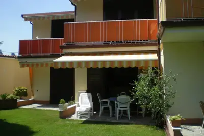 Image de 2 Zi. Appartement, rez de chaussée avec terrasse directement sur le lac
