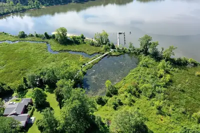 Image de Sunset Waterfront Nature Preserve Kayaks Eagles Osprey Snakehead Butterflies