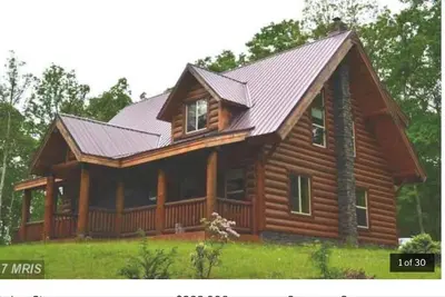 Image de Cabane en rondins confortable et très privée!