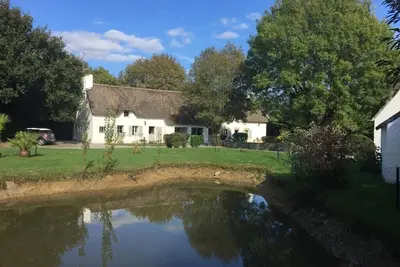 Image de Jolie maison décoration chaleureuse, 4000m2 de jardin avec mare.