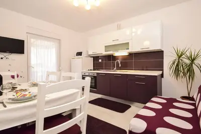 Image de Appartement: A2 / 2