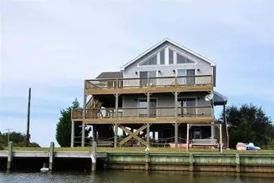 Image de Mermaid Hideaway est le nom de notre belle maison