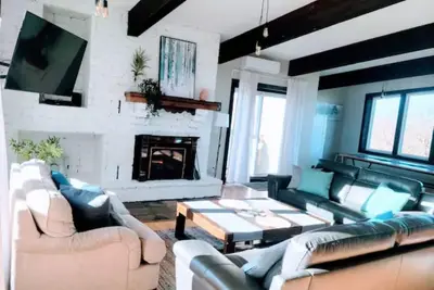 Image de Chalet de style suisse avec Internet gratuit et sauna intérieur