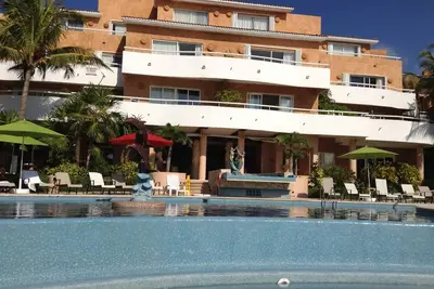 Image de Grand condo de 2 chambres dans Private Oceanfront Resort