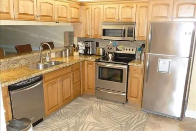 Image de 2br Condo de luxe avec un accès facile Plage