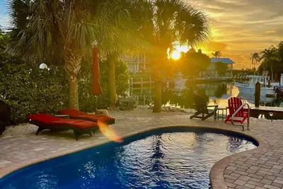 Image de Piscine 4/3 avec chauffage / canal / quai de bateau / Villa - Blue Breeze @ Sombrero Beach